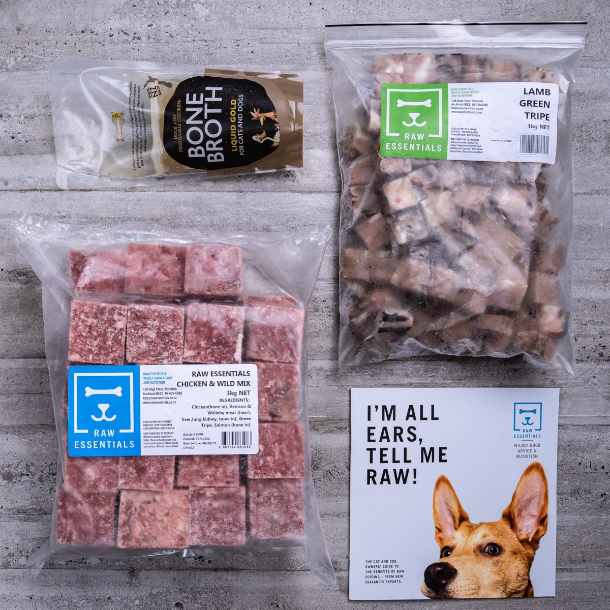 Assortment Of Raw Essential Products For Puppies Including, Bone Broth, 1KG Plastic Pack Of Small Cubed Lamb And Green Tripe Meat Mix, 3KG Plastic Pack Of Cubed Chicken And Wild Meat Mix, Raw Essentials Advice And Nutrition Pamphlet