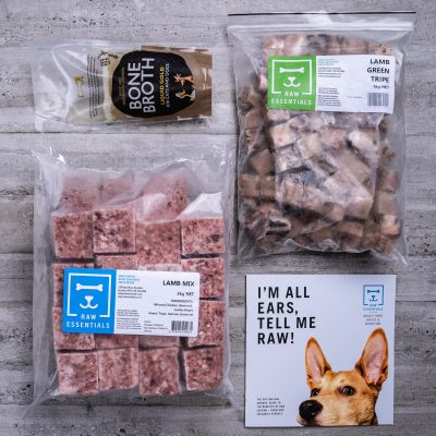 Assortment Of Raw Essential Products For Dogs Including, Bone Broth, 1KG Plastic Pack Of Small Cubed Lamb And Green Tripe Meat Mix, 3KG Plastic Pack Of Cubed Lamb Meat Mix, Raw Essentials Advice And Nutrition Pamphlet