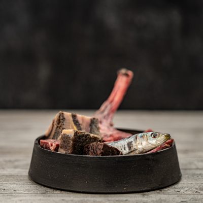 Assortment Of Ingredients Including, Wallaby Shoulder, Pilchards And Tripe Meat In Metal Pet Bowl